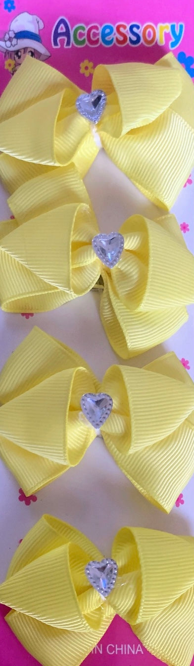 4pc medium bow with rhinestone heart